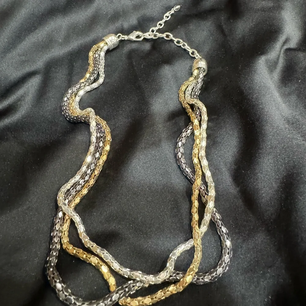 Necklace 3 Strand looks like Gold Silver Platinum. 16 to 20 in adjustabl…